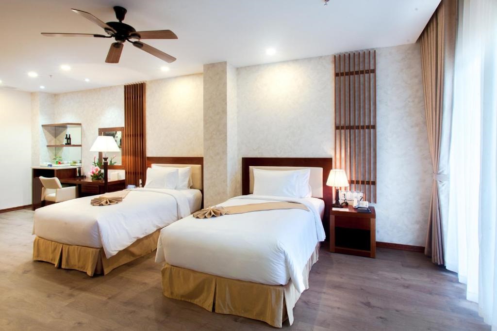 A LADALAT Hotel room example; the promotional room category is Deluxe.