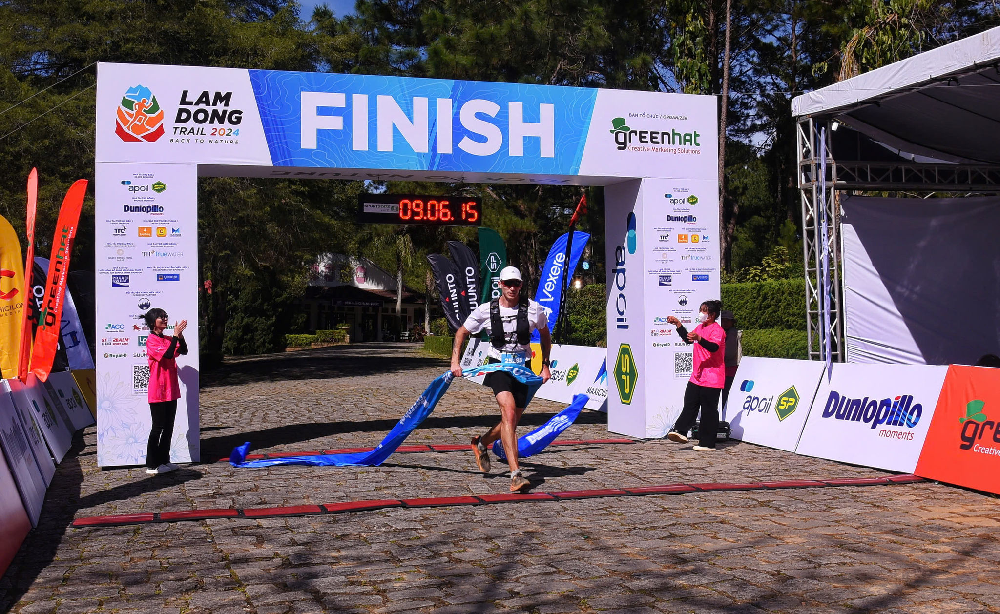 A distance-category winner finishes at Lamdong Trail 2024; historical photograph.